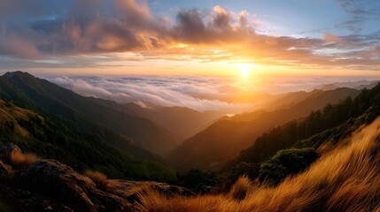 Obraz premium Majestic panoramic golden sunrise radiant over misty mountain peaks and valleys at dawn
