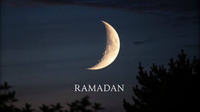 Serene Crescent Moon Over Dark Sky with Ramadan Text Below