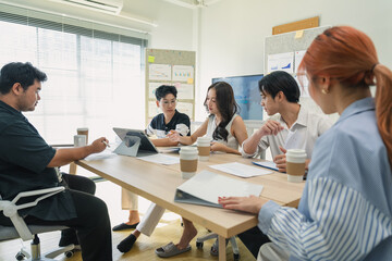 Fototapeta premium Business professionals discussing strategy in office meeting using tablet analytics and reports, teamwork collaboration analyzing market data, corporate planning session driving innovation, productivi