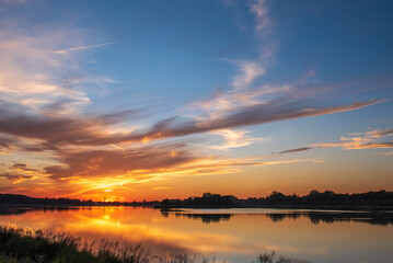 Fototapeta premium sunset over the lake