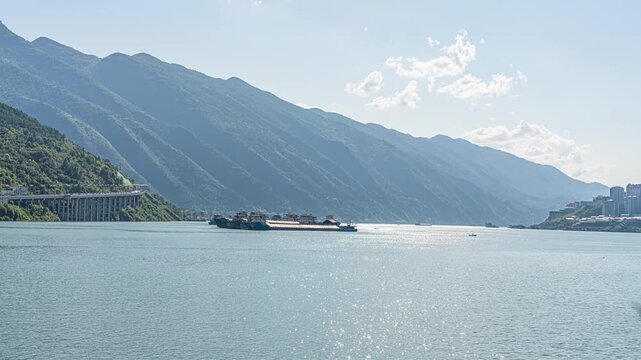 Cargo Ship on Daning River in Chongqing with Mountain Landscape