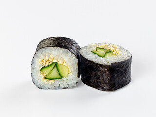 Two cucumber and sesame maki sushi rolls isolated on white background © Andrei Starostin
