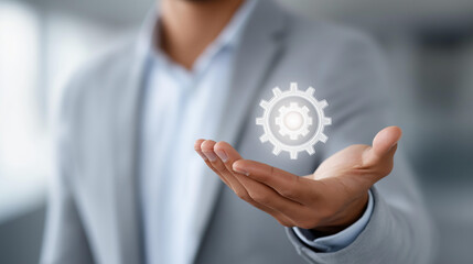 Faceless businessman holding a glowing automation icon surrounded by workflow simplification symbols, reducing manual tasks concept, operational efficiency photography, defocused