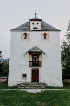 Small Baroque Chapel at Mount Calvary in Castelrotto, South Tyrol &ndash; Traditional Alpine Sacred Architecture with Shingle Roof and Frescoes