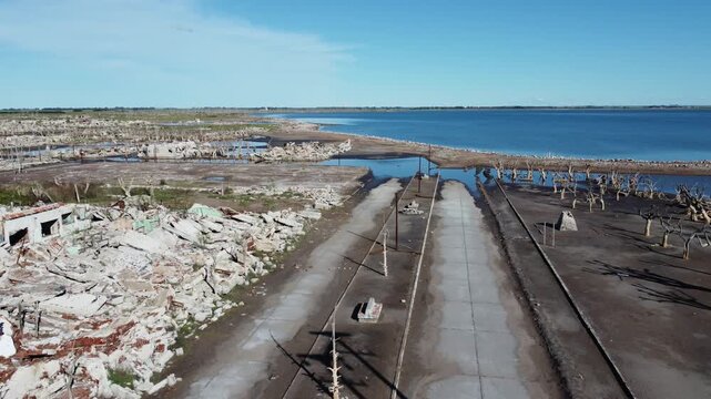 Aerial perspective of destroyed houses and streets in abandoned Epecuen