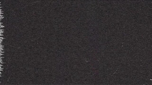 Dark Textured Surface with Horizontal Lines and Jagged Edge