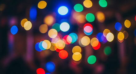 Obraz premium Colorful Bokeh Lights in Dark Background, Blurred Festive Scene