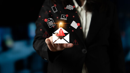 A business professional engages with multiple email notifications and alerts, highlighting the importance of swift communication and security in a contemporary office scenario. Gantry © InfiniteFlow