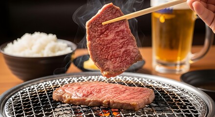 A hand uses chopsticks to lift a grilled steak; other food items in the frame