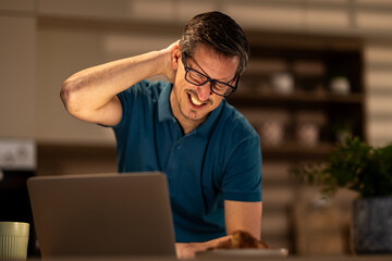 Man Having Pain In Neck After Working All Day