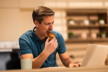 Man Working And Eating In The Morning