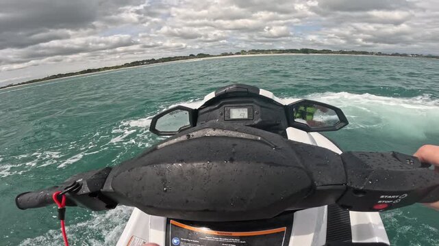Riding personal watercraft on the shores of Rio Hato in Panama on vacation fun ocean play