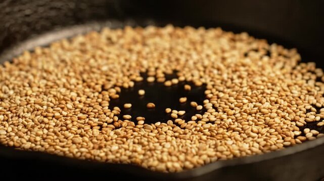 Toasting Sesame Seeds in a Pan for Enhanced Flavor and Aroma.