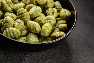 Gnocchi with spinach tasty snack fresh gourmet food background on the table rustic food top view copy space vegetarian and vegan food marketing concept photo