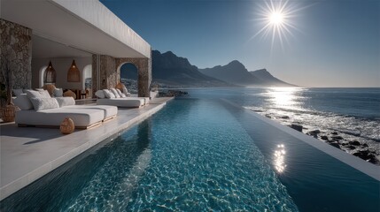Obraz premium Modern luxury seaside villa with infinity pool, sun, mountains, ocean view