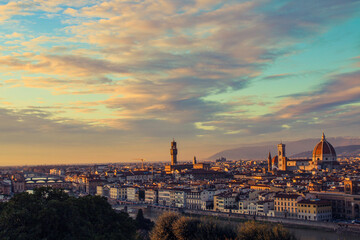 Obraz premium Panoramic view of Florence, Italy, at sunset. Famous view on Firenze and Santa Maria del Fiore Cathedral from the Michelangelo Square (Piazzale Michelangelo) in Florence, Tuscany, Italy.