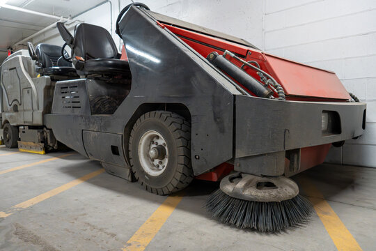 Industrial Cleaning Machine Parked Indoors, Ready for Floor Maintenance in a Commercial Facility