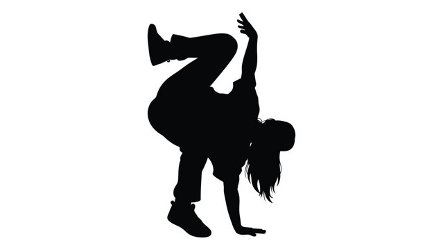 Silhouette of a dancer performing a dynamic handstand breakdance pose