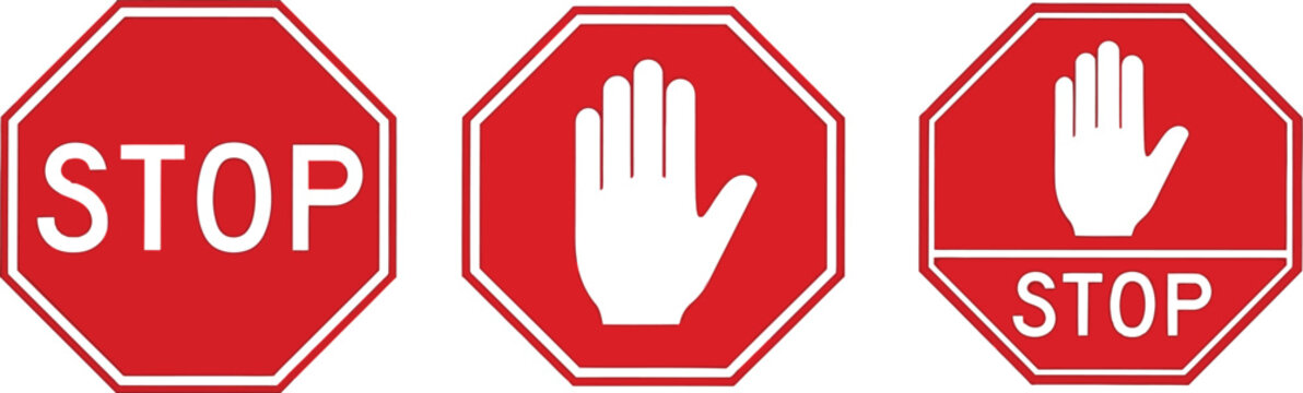 Red stop signs with white text and hand symbol