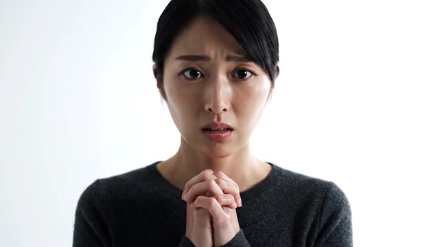 A woman with a surprised expression appears in this video.