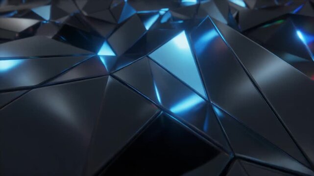 Geometric shapes with reflective surface, close-up, in a studio setting with colorful background lighting, used for design or tech concepts