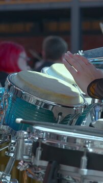 Enthusiastic Percussion Players Shape Dynamic Syncopated Sounds Amidst Vibrant Concert Atmosphere. Media