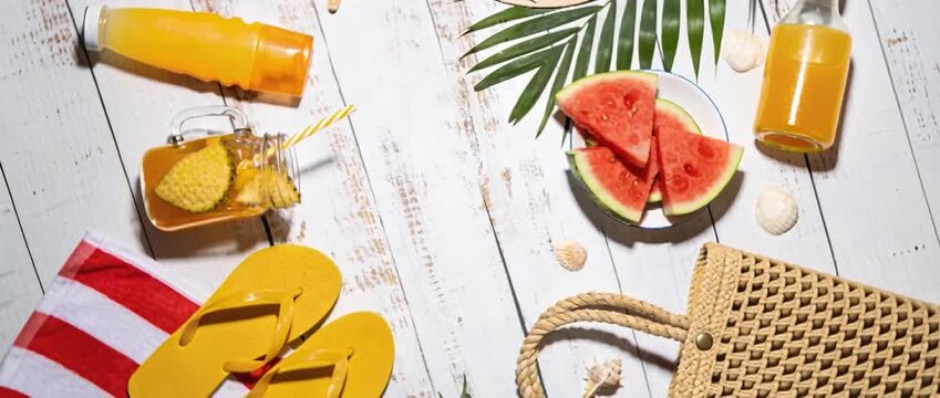 Commercial Footage Inspired By A Flat-Lay Of Vibrant Summer Beach Accessories On A White Wooden Background Straw Hat With Sunglasses, Tropical Fruits, Yellow Flip-Flops