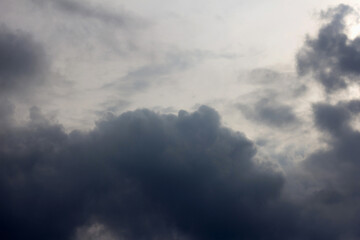 Fototapeta premium Dramatic Storm Clouds Gathering in a Dark, Ominous Sky