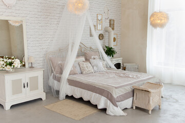 Romantic bohemian style bedroom interior with a canopy bed, vintage furniture, and soft natural light.
