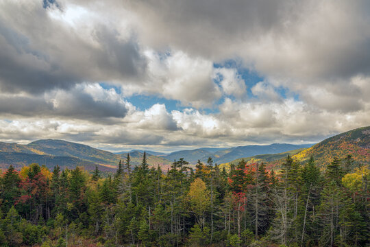 Mountains with Autumn Foliage and Beautiful Clouds