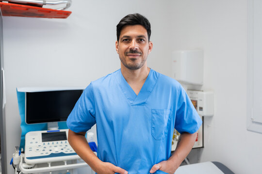 Portrait of confident doctor posing in hospital room