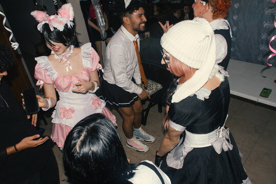 Fun cosplay gathering with friends in playful outfits