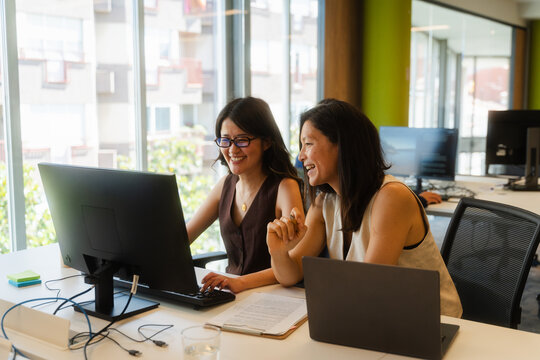 Women working together in a lively environment