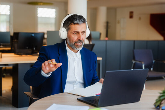 Executive takes part in a web meeting