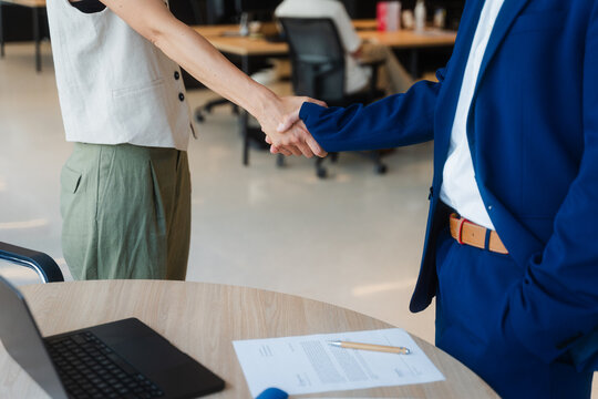 Businessman welcomes a customer