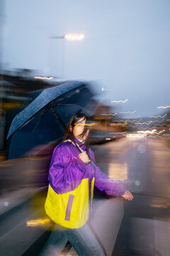Rainy Evening Street Pedestrian Scene