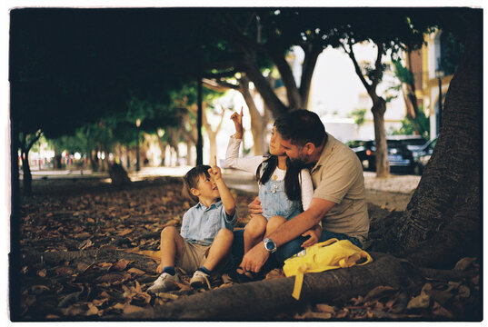Father spending time with his kids at park