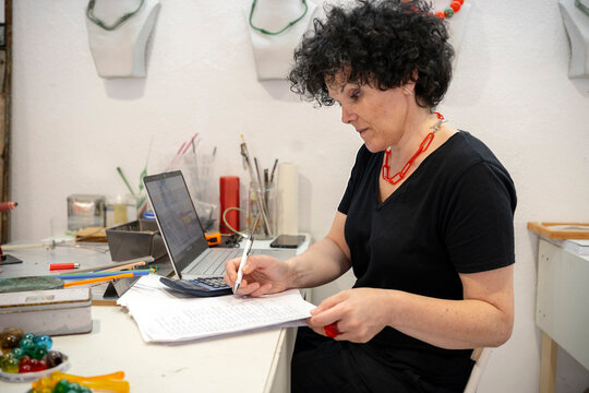 Woman reviewing company expenses