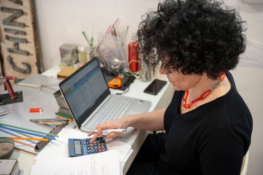 Woman reviewing company expenses