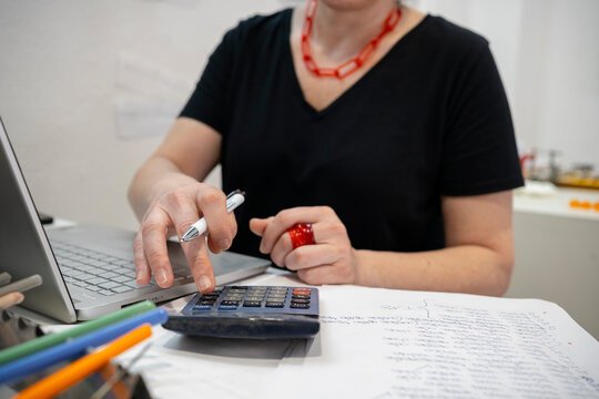 Woman reviewing company expenses