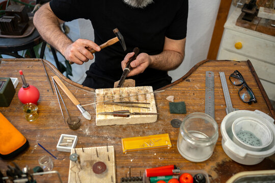  Man adjusting silver ring