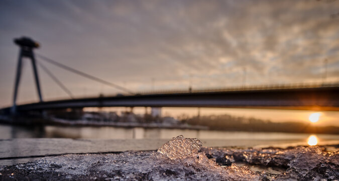 snowflake crystal diamond in the sunlight and New bridge in Bratislava