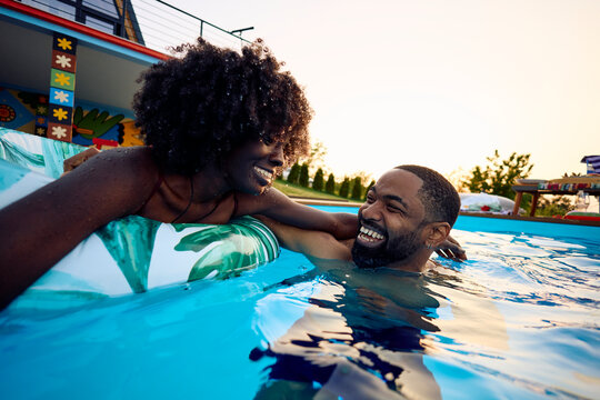 Couple having fun in the pool