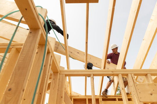  Construction Worker  hold wood roof