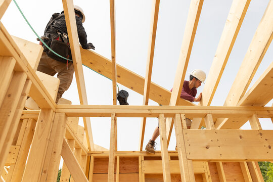  Construction Worker Framer hold wood roof