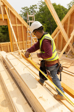  Construction worker tape measure hand