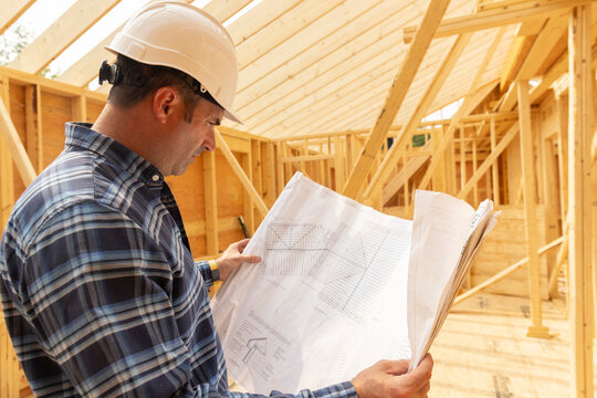 Residential Construction Site with architect 