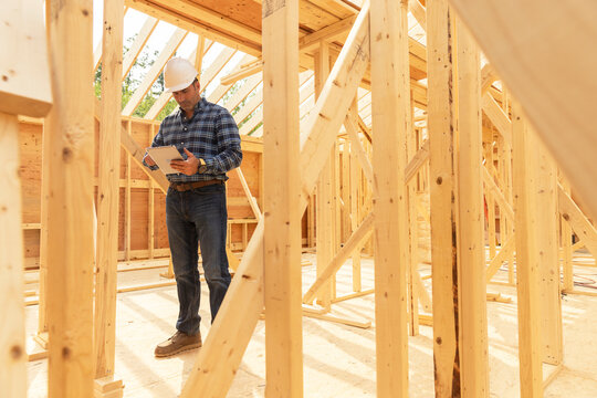 Residential home Construction Site builder tablet  computer 