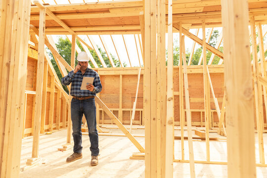 Residential Construction Site with tablet computer  