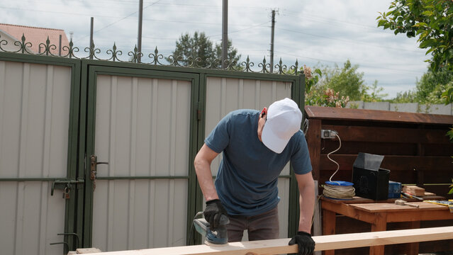 man working on wood